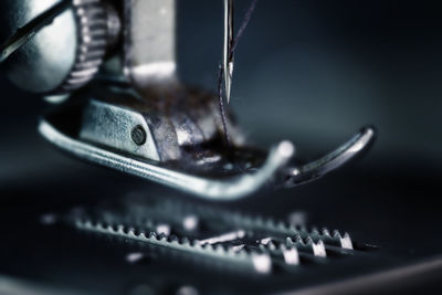 Close-up of chain on table