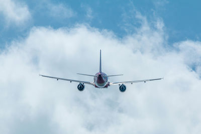 Low angle view of vapor trails in sky