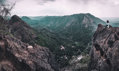 Panoramic view of rocks and mountains against sky