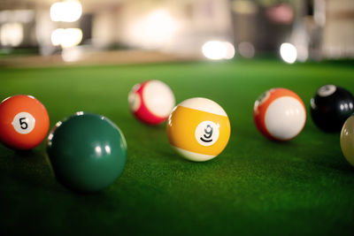 Close-up of multi colored balls on table