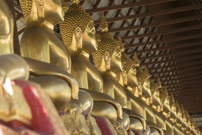 Golden buddha statues in temple