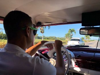 Portrait of man driving car