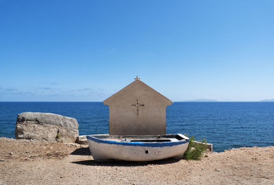 View of beach against clear sky