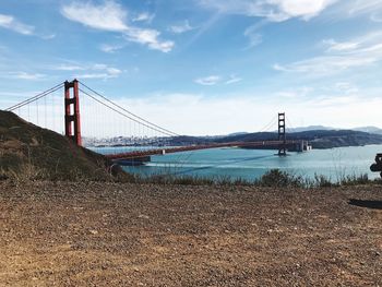 View of suspension bridge over river