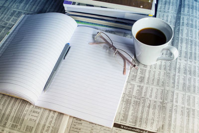 High angle view of coffee cup on table