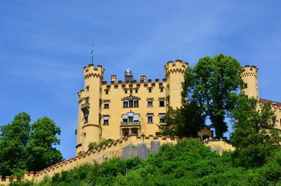 Low angle view of fort against blue sky