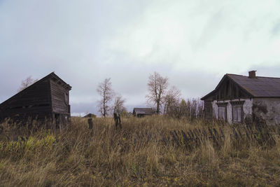 House on field against sky