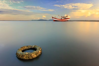 Scenic view of sea against sky during sunset