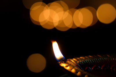 Close-up of illuminated candles