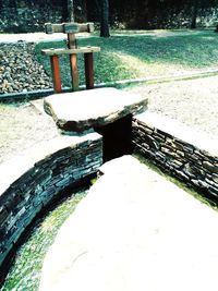 High angle view of bench in park