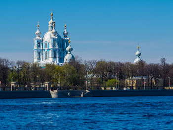 View of temple building against blue sky