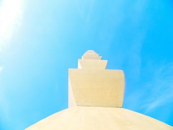 Low angle view of building against blue sky