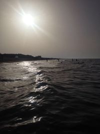 Scenic view of sea against clear sky during sunset