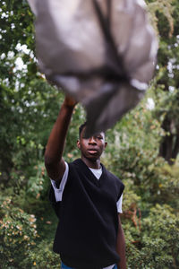 Young african american man portrait. plastic pollution, ecology concept