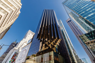 Low angle view of skyscrapers against sky
