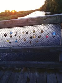 Scenic view of river against sky during sunset