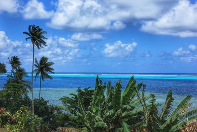 Scenic view of sea against cloudy sky