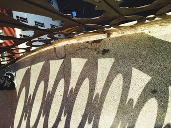 High angle view of bicycle sign on street