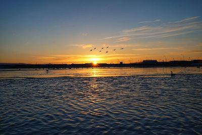 Scenic view of sunset over sea