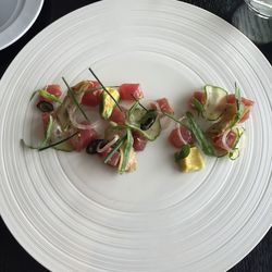 High angle view of chopped fruits in plate on table