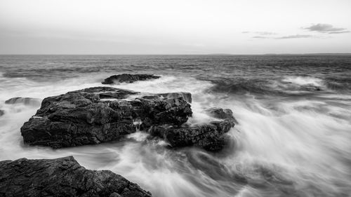 Scenic view of sea against clear sky