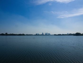 Scenic view of sea against blue sky