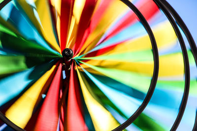 Close-up of colorful pinwheel spinning outdoors