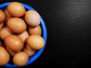 High angle view of eggs in container