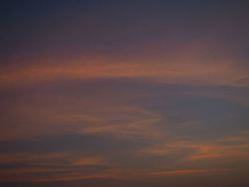 Low angle view of dramatic sky during sunset