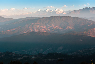 Scenic view of mountains against sky during sunset