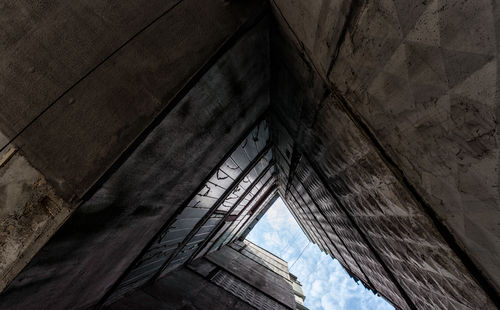 Low angle view of old bridge against sky