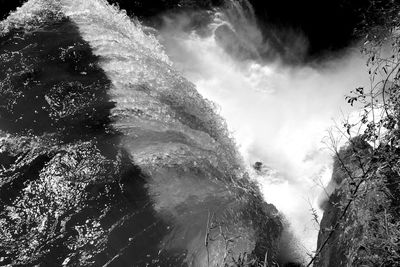 Panoramic view of waterfall against sky