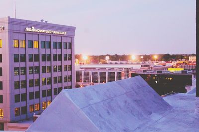 Buildings in city against sky