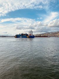 Nautical vessel on sea against sky