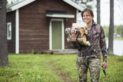 Woman carrying firewood