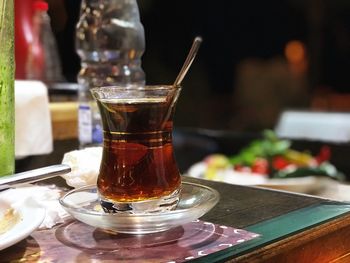 Close-up of tea in glass on table