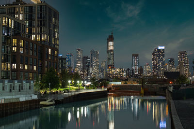 Illuminated buildings in city at night