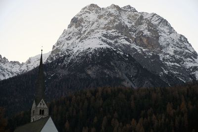 Panoramic view of snowcapped mountains against clear sky