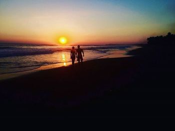 Scenic view of sea at sunset