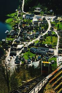 High angle view of railroad tracks amidst buildings in city