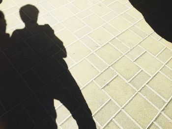 Shadow of people on wall