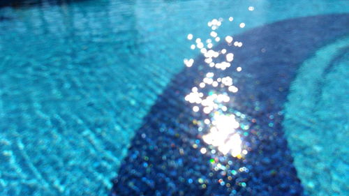 Close-up of illuminated blue water