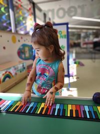 Girl playing the keyboard 