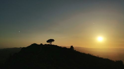 Scenic view of landscape against sky during sunset
