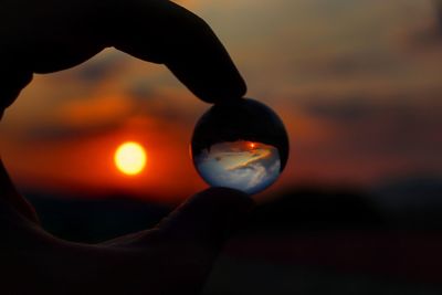 Beautiful sunset in a small cristal ball