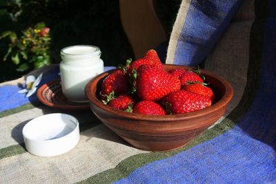 Close-up of strawberries in bowl on table