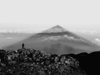 SCENIC VIEW OF MOUNTAIN AND AGAINST SKY