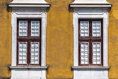 Closed window of old building