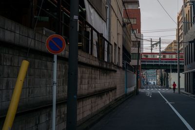 Road sign on street in city