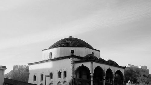 Low angle view of historic building at monastiraki against sky